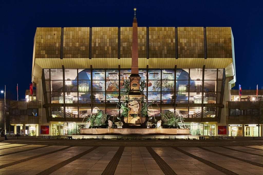 Radiating onto Augustusplatz, the Gewandhaus Hall’s vast interior mural, 'Gesang vom Leben' (Song of Life) by painter Sighard Gille is the largest contemporary painting of its kind in Europe. Image Punctum / Leipzig Travel.