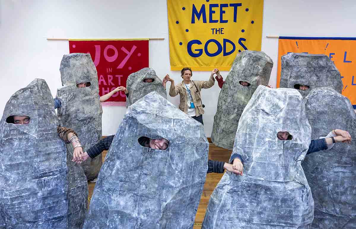 Artist Jeremy Deller with students of Duncan of Jordanstone College of Art and Design and University alongside artwork that will be included in Meet the Gods. Image Neil Hanna.